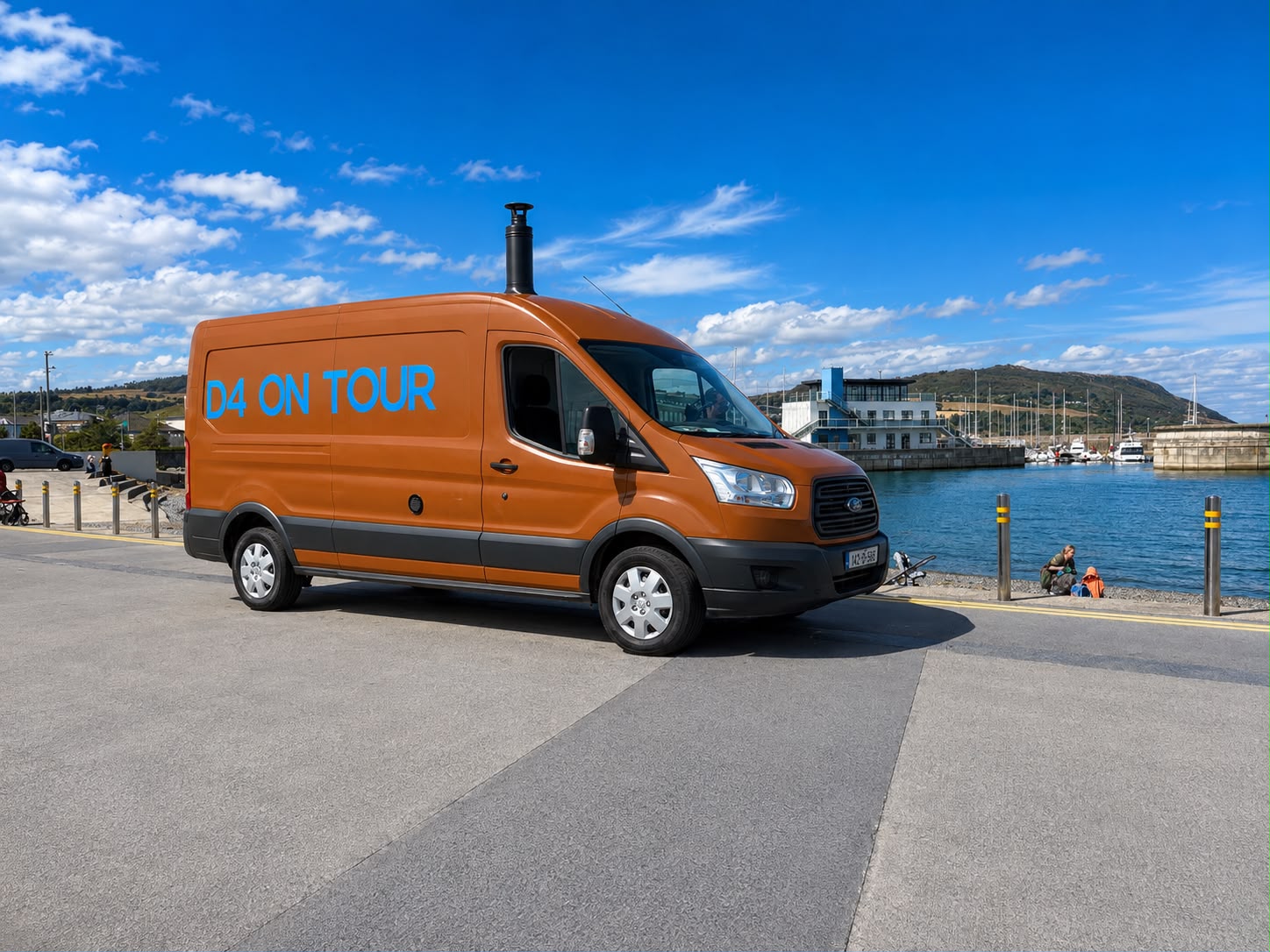 D4 On Tour sauna van beside the water